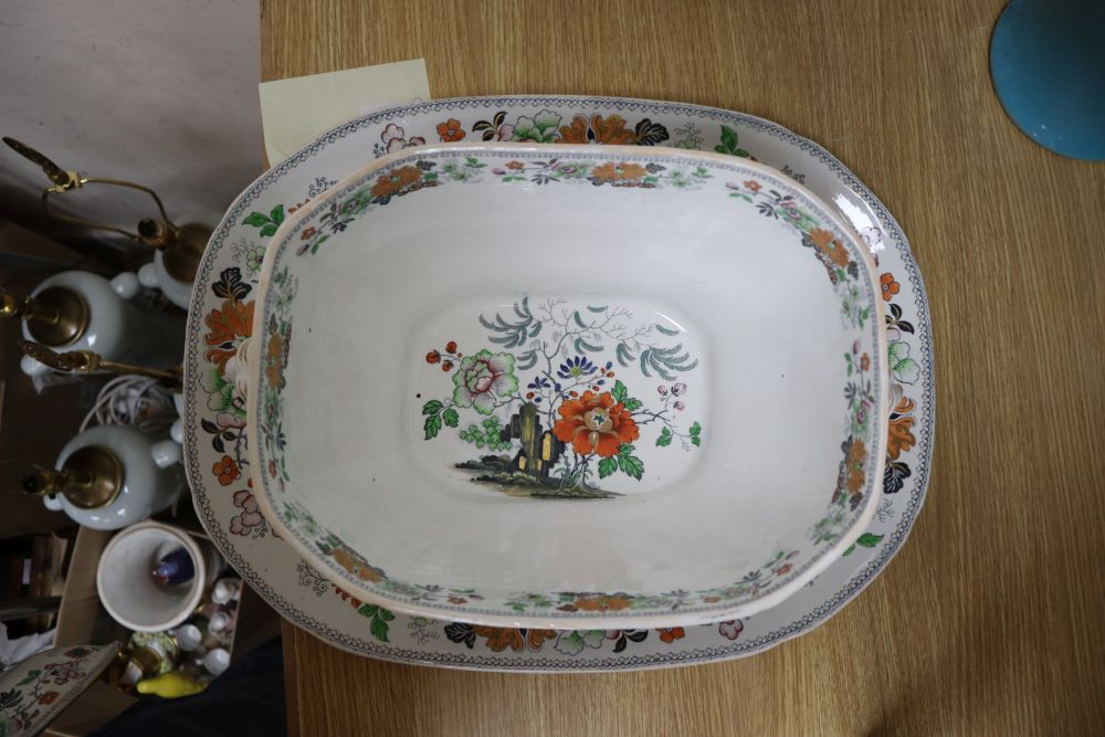 A Davenport stone china soup tureen and cover and a meat platter, printed and painted with chinoiserie flowers